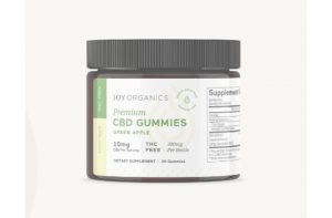A container of premium USDA-certified organic Joy Organics CBD Gummies from Top THC Shop.