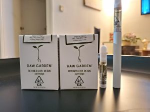 Authentic Raw Garden live resin cartridges with golden oil and clear glass housing.