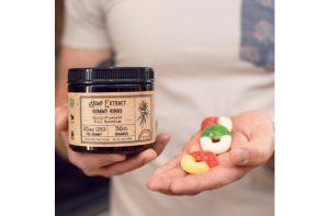 A container of high-potency R+R Medicinals CBD Gummies from Top THC Shop.