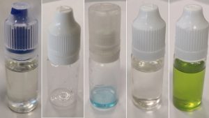A dark glass bottle of 2000MG THC Vape Juice alongside a premium sub-ohm vape kit.