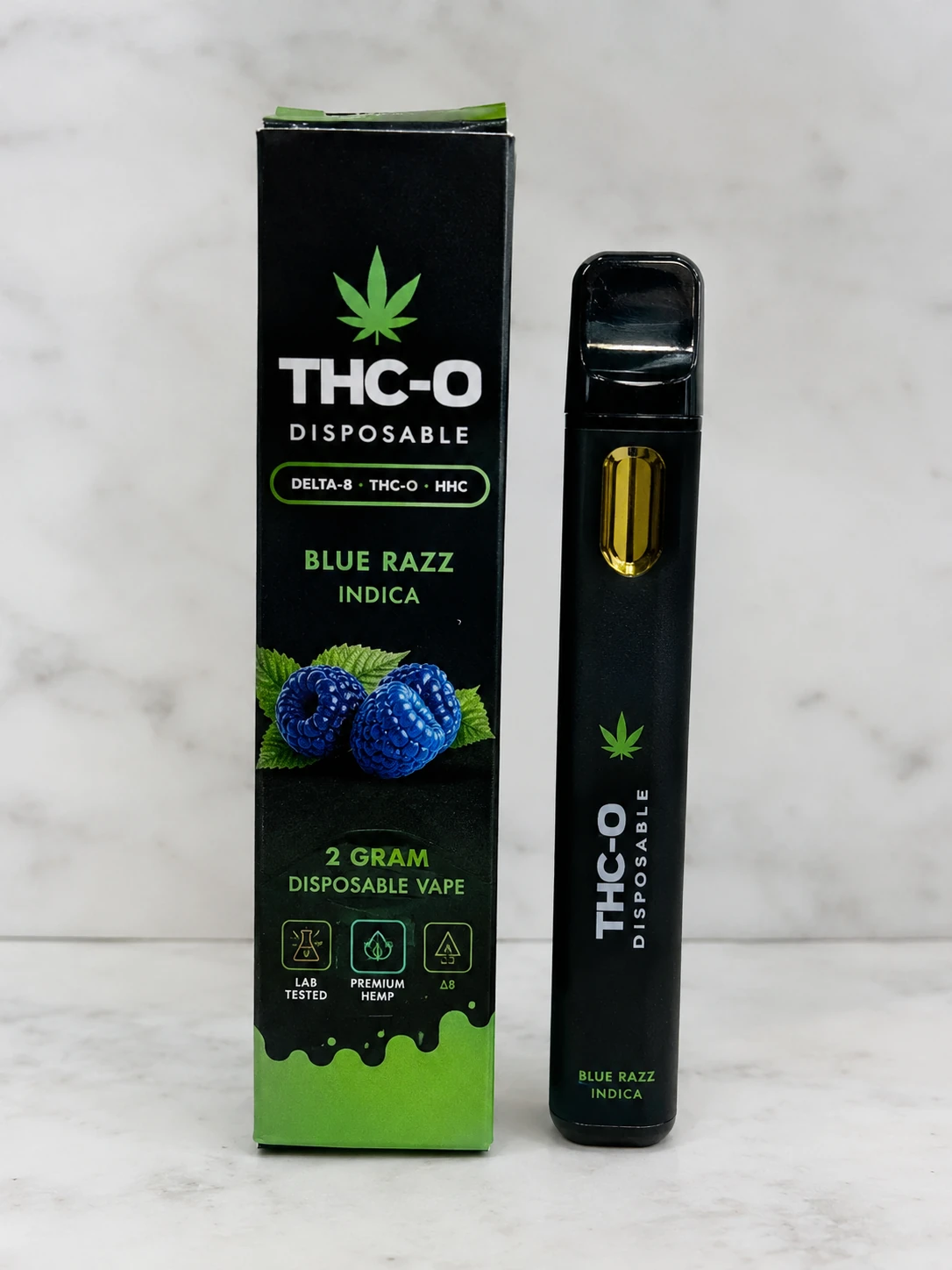 Black THC-O disposable vape with black and green Blue Razz Indica product packaging