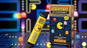 A close-up side view of an authentic packman 2g disposable vape pen highlighting its matte finish body and golden oil window.