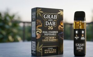 Authentic Grab and Dab 2g dual chamber disposable vape pen with clear golden distillate chambers.